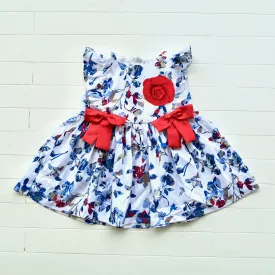 Vinca Dress in Cool Leafy Cutout with Red Ribbon